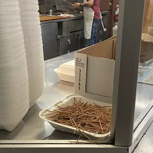 a man preparing food in a kitchen