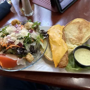 Fish sandwich with side salad