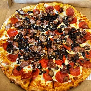No sauce. Pepperoni, olives, mushroom and sausage.