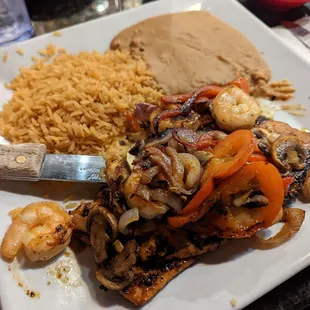 Juan&apos;s Special (chicken, peppers, onion, mushroom, shrimp with rice and beans)