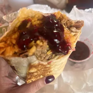 Burrito with chipotle black berry sauce. The most delicious and unique sauce!