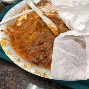 a plate of food on a tray