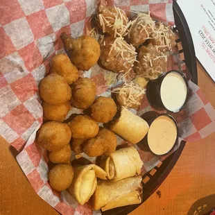 Appetizer sampler with garlic parm wings, mushrooms, and wraps
