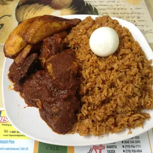 Jolof rice with beef and fish. Okay. It wasn&apos;t anything spectacular, but we can now say we had Ghanan food. Great plantains.