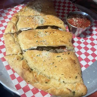 Calzone with beef, pepperoni and mushrooms ( you create your own and pick toppings)