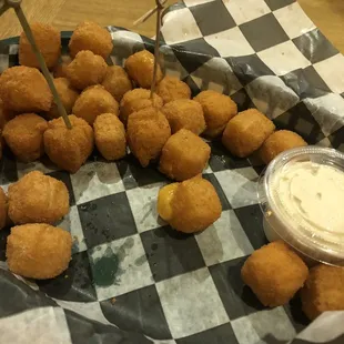 Cheddar balls. The horsey sauce was good.