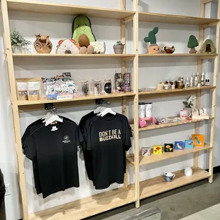 t - shirts on display in store