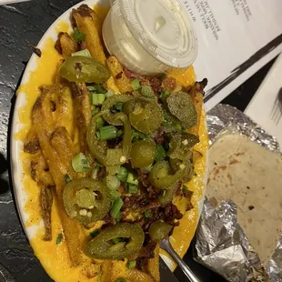 Cheese fries with jalapeño, chives, and bacon. And the ranch was amazing!