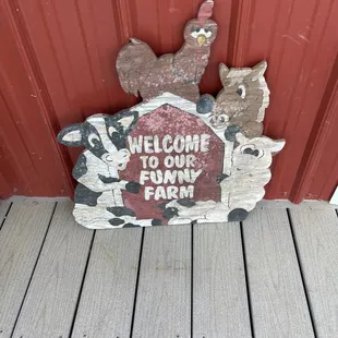 a welcome sign on a porch