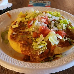 Indian Taco on what I roughly measured as a 10" plate. So about a 6" diameter $10 Indian Taco.