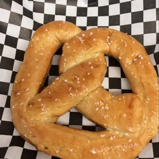 HOT PRETZELS,  cinnamon sugar, garlic Parmesan, ranch, salt.  With dipping sauce. Nacho cheese, caramel, condensed milk,  Hot...