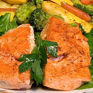 Salmon dinner over Sauteed Spinach