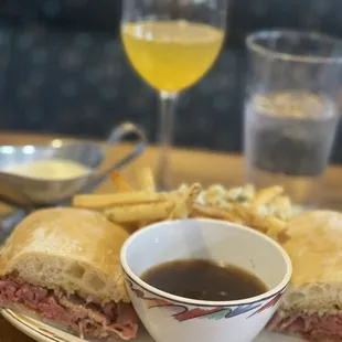 French dip, medium rare, with jack cheese, garlic fries and a mango orange mimosa (what&apos;s left of it anyway)