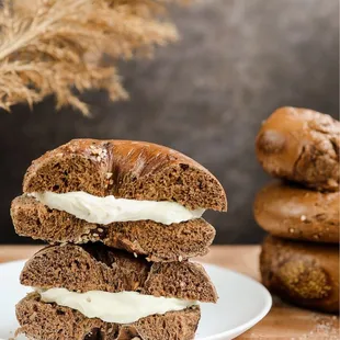 a stack of bagels with cream filling