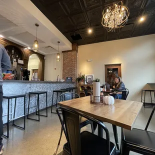 a woman sitting at a table