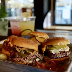 a plate of sandwiches and french fries