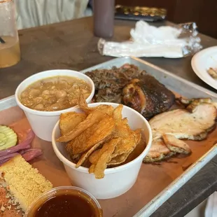 pulled lamb shoulder, Alabama turkey and chicken with chips and beans