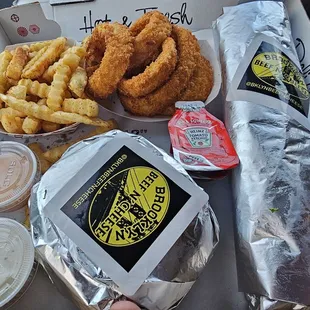 French fries, onion rings, bacon cheeseburger, and chopped cheese sandwich
