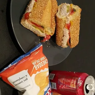 Tuna melt with chips and soda