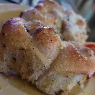 a closeup of a plate of bread rolls