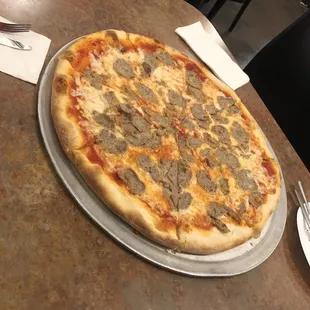 A large pie with meatball