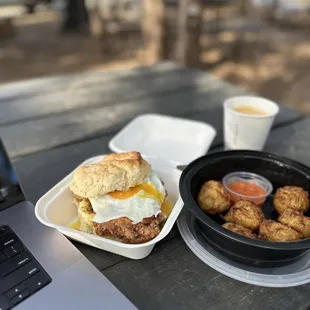 Fried chicken biscuit with egg and potato fritters