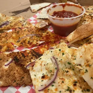 Flatbread with sauce (got tipped enroute).  Not what we expected, but was fine.