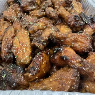 chicken wings in a foil container