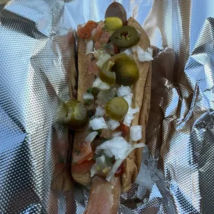 Baja dog (with extra free onion and jalapeños)