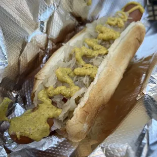 Hot dog with sauerkraut and deli mustard