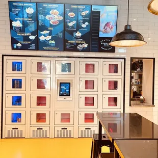 a row of tables and chairs