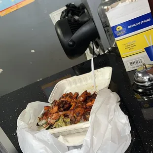 a sandwich in a plastic container