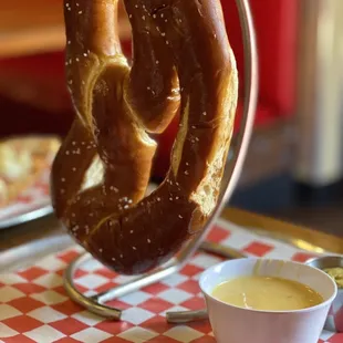 a pretzel with mustard