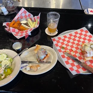 1/2 eaten, but hey, meatball sub, wings, salad.