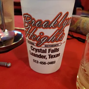 a drink in a paper cup