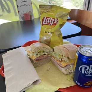 a bag of chips and a sandwich