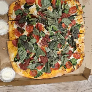 It was like he felt bad for making me wait long time and just threw in hand full of basil..