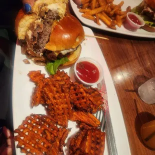 Bacon cheeseburger and sweet potato waffle fries.