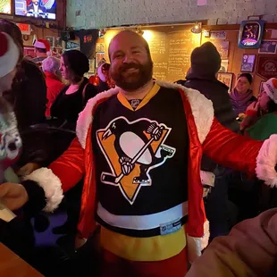 a man dressed as a penguin