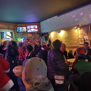 a large group of people sitting at tables