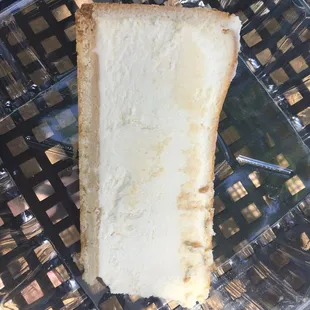 a slice of cake in a plastic container