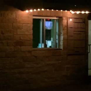 Order from the window but make sure you tell them where you are sitting.