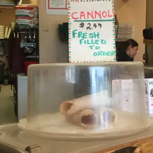 Fresh filled cannoli in regular, chocolates and pastacio
