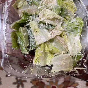Ceasar Salad. Swimming in something that is not Ceasar salad dressing.