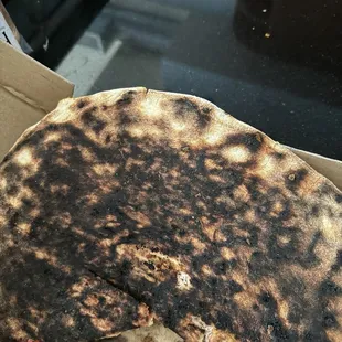Burnt four cheese pizza