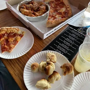 Crapy over priced pizza terrible wings and burnt knots