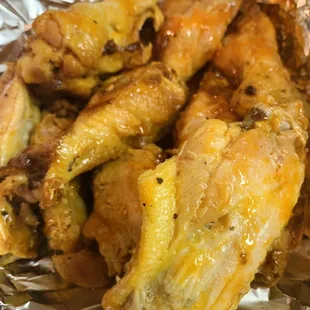 a plate of chicken wings