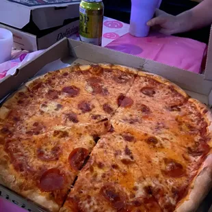 Walked in they said they were closed at 9pm when they close at 10 so we ordered on the phone instead 2 pizzas $60