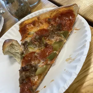 Half eaten garlic Garlic Knots, pepperoni/ Sausage and Peppers , Onion's pizzas