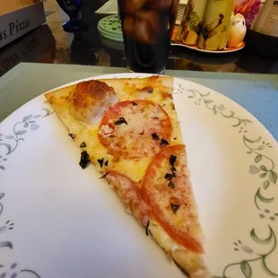 A slice of Capri pizza.